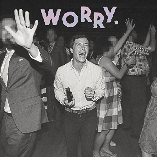 Black-and-white image of a man surrounded by dancing people, with "WORRY" written above.