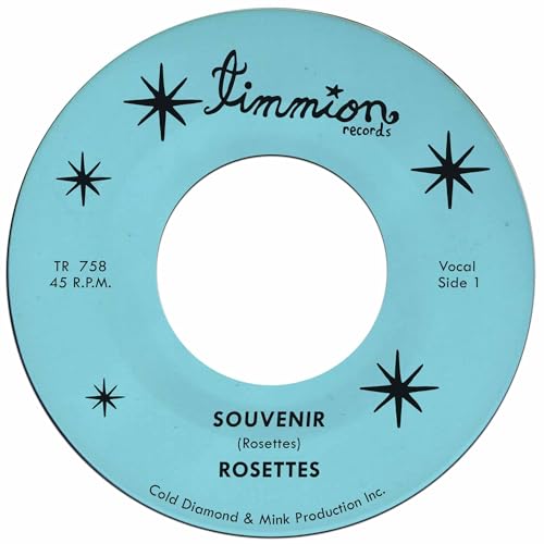 Light blue 45 RPM vinyl record label with black text and star icons.