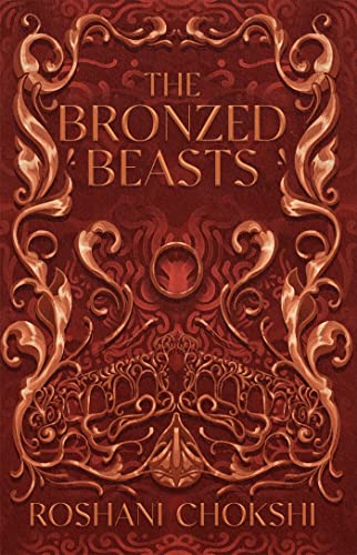 Book cover for “The Bronzed Beasts” with ornate gold designs on a red background.