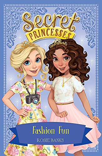 Book cover featuring two young girls with long hair and a camera.