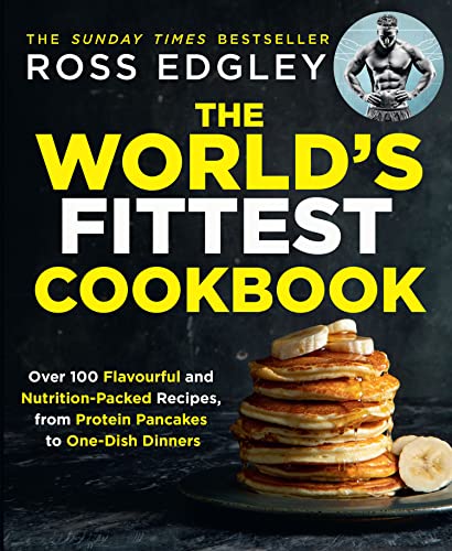 Cookbook cover with bold yellow text, a fitness trainer, and stacked pancakes.