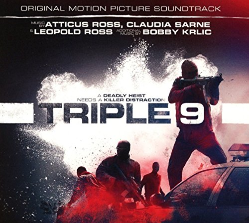 "Soundtrack cover for 'Triple 9' with men in tactical gear amidst an explosion."