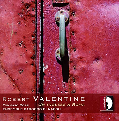Red door with metal handle, album cover for Rossi/Valentine CD.