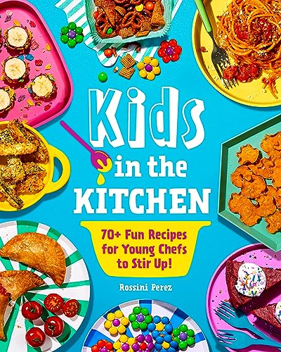 Cookbook “Kids in the Kitchen” with colorful food arrangements around it.