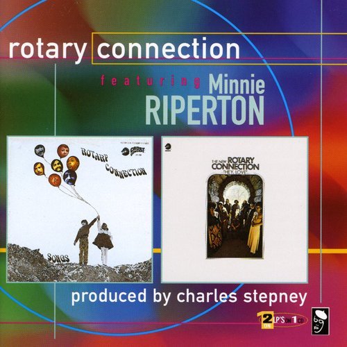 "Album cover featuring two vinyl records with abstract and group images, red and black background."