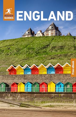 Rough Guides England travel book cover featuring colorful beach huts below a grassy cliffside building.