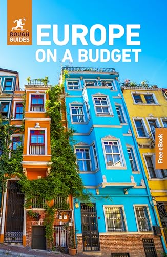 Book cover featuring colorful buildings in orange, blue, and yellow under a clear sky.