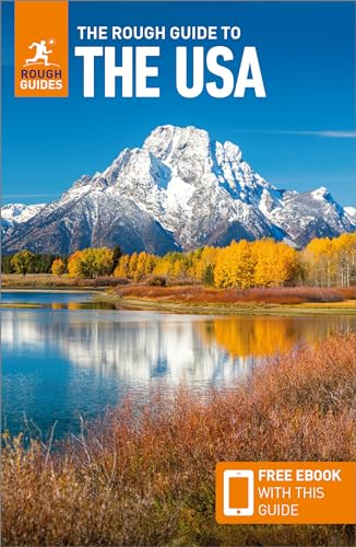 The Rough Guide to the USA book cover featuring a snowy mountain and lake.