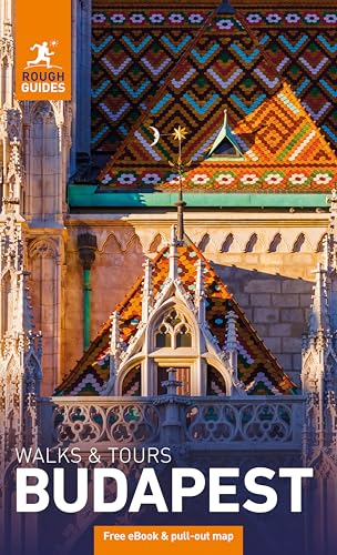 Close-up of Matthias Church's colorful tiled roof in Budapest on a travel guide cover.
