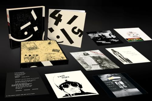 Vinyl record set "Rough Trade 45s: Volume 1" with accompanying artwork.