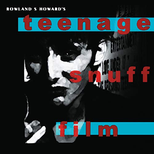 "Album cover with a black-and-white photo and bold red and blue text."