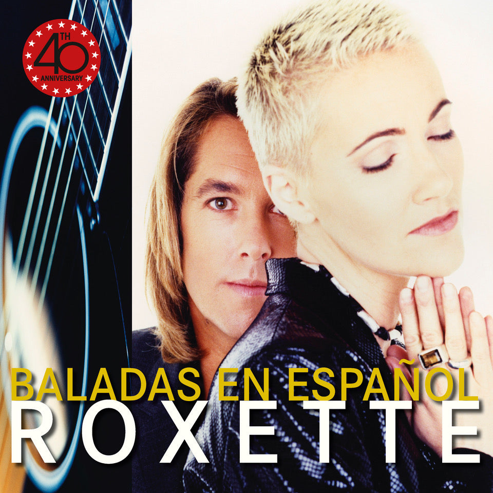 Roxette album cover, featuring Per Gessle and Marie Fredriksson, with text.
