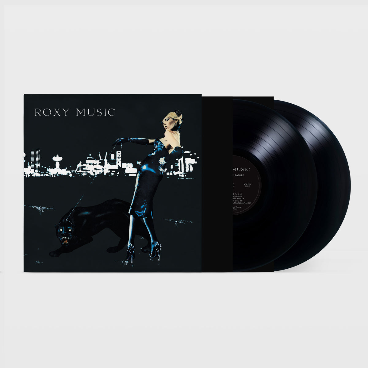 Roxy Music “For Your Pleasure” vinyl record with cover art and black discs.