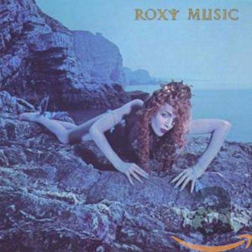 Roxy Music “Siren” CD cover: woman reclining on rocky coastline.