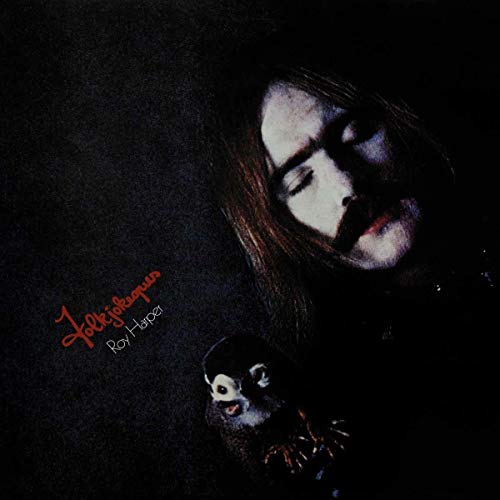 Roy Harper album cover: a portrait with a chimpanzee, dark background.
