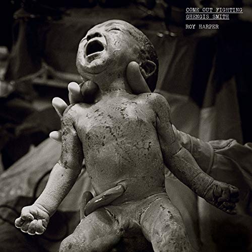 Black and white album cover featuring a textured, sculpted infant figure.