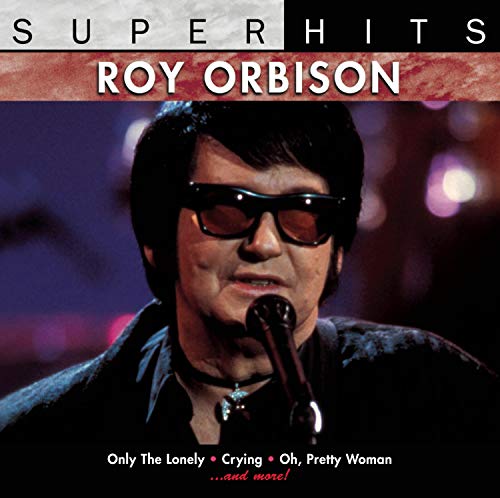 Roy Orbison CD cover featuring the singer in sunglasses with a microphone.