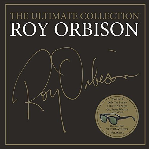 "Roy Orbison CD cover with black background, gold text, and signature, featuring sunglasses graphic."