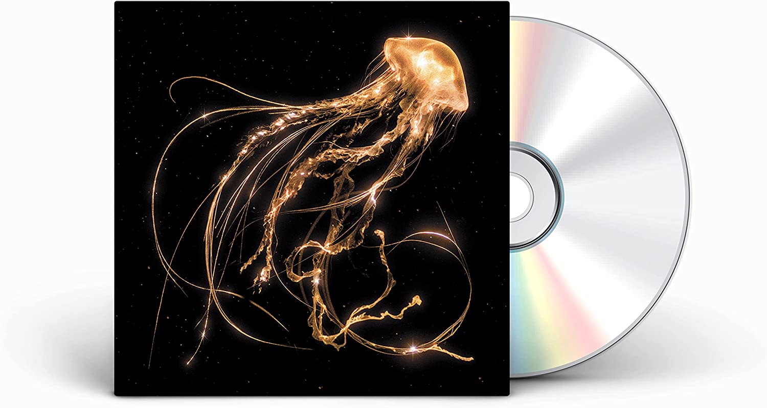 "CD case with glowing jellyfish artwork and a silver CD."