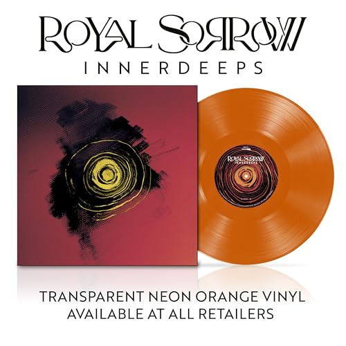Orange vinyl record and album cover with abstract circular design.