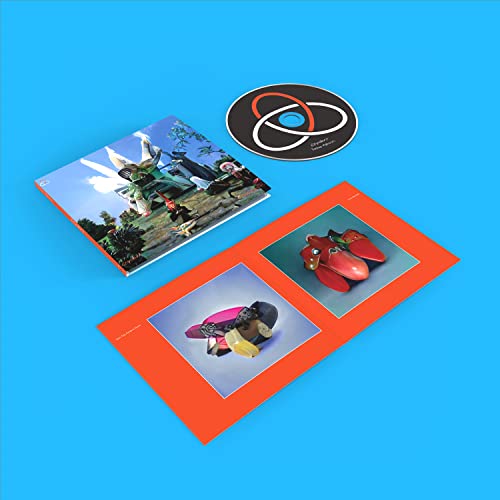 Royksopp "Profound Mysteries" CD packaging with surrealist strawberry imagery.