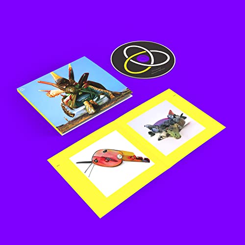 Royksopp CD cover with insect illustrations on yellow and blue backgrounds.