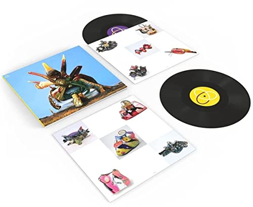 Royksopp vinyl record with colorful toy robot imagery and inserts.