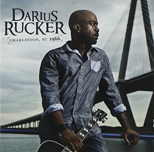 Darius Rucker album cover with him holding a guitar, bridge background.