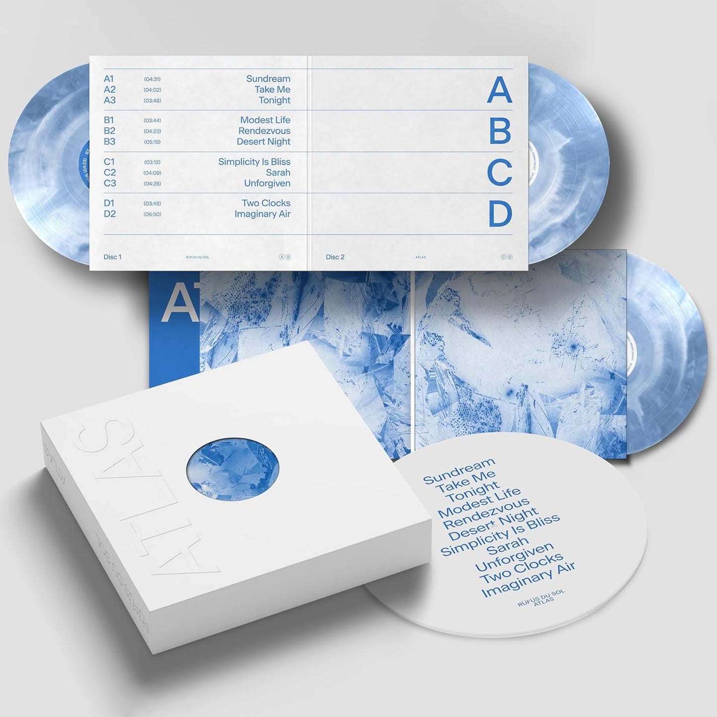 RÜFÜS DU SOL's "Atlas" double vinyl record with blue and white cover art.
