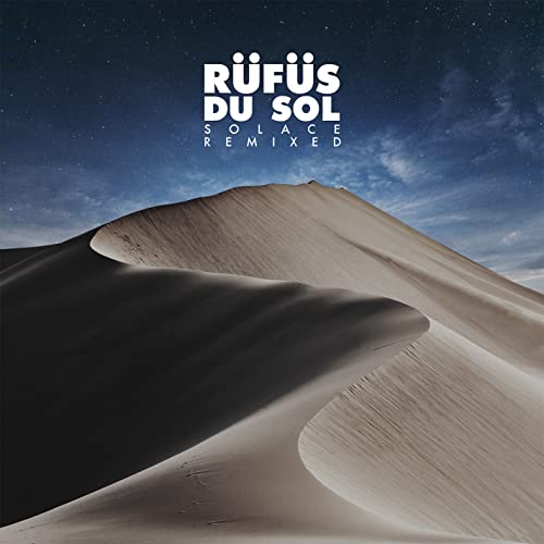 Rufus Du Sol album cover with desert landscape under a starry sky.