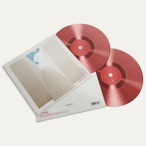 Rufus Du Sol “Surrender” red vinyl record with album cover shown.