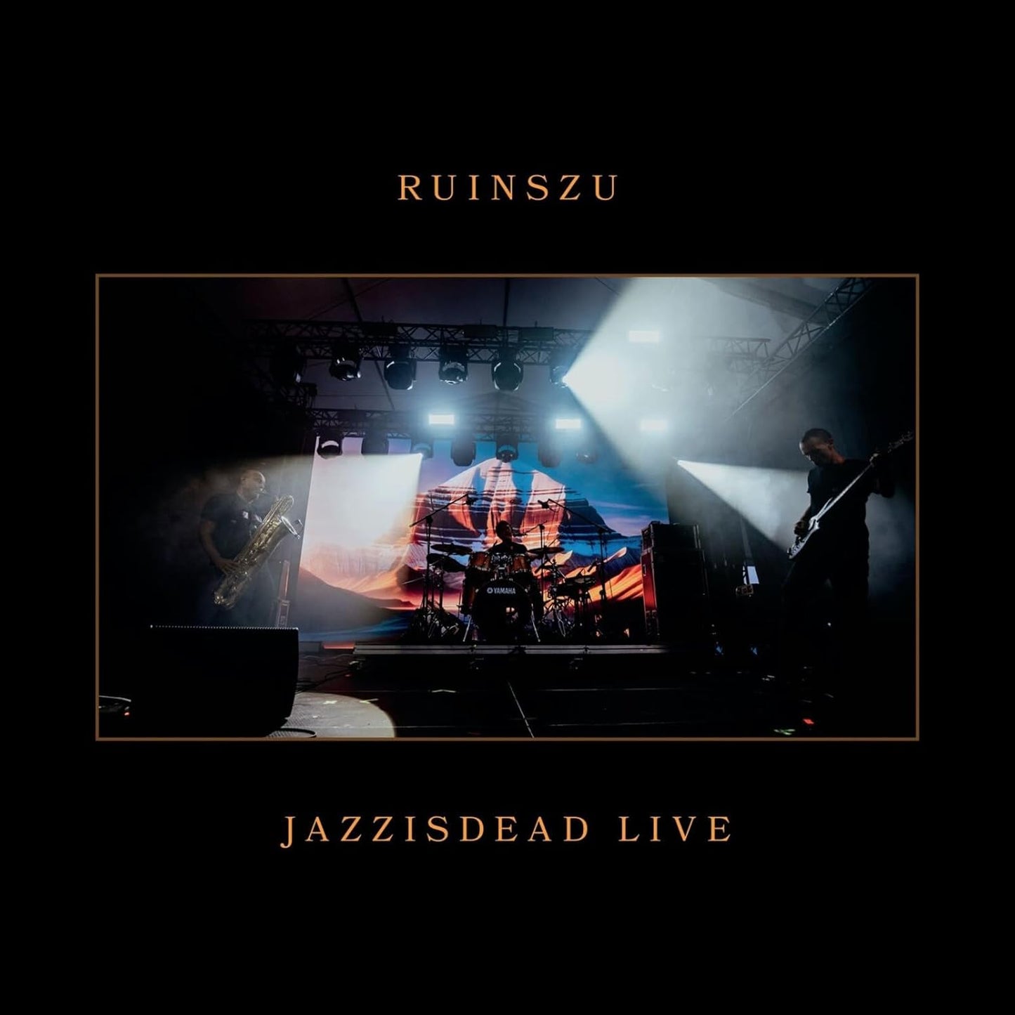 Ruinszu - Jazzisdead Live CD cover: band performing on a dark stage.