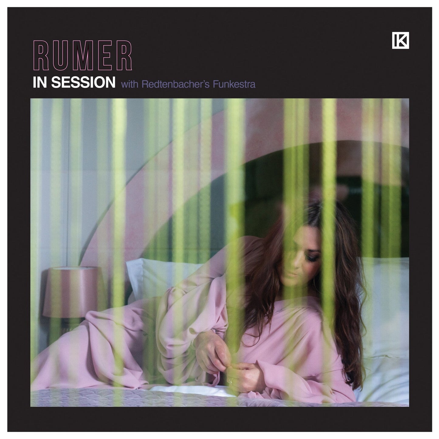 Album cover for Rumer’s “In Session” featuring a woman behind sheer curtains.