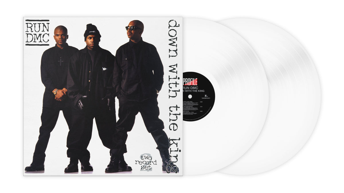 Run DMC album cover featuring three men in black next to two white vinyl records.