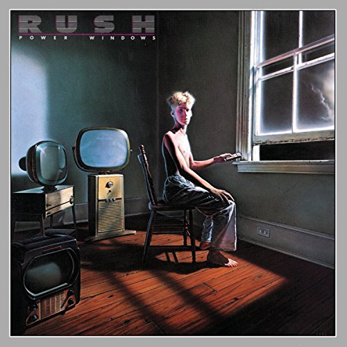 Rush album cover: boy with vintage TVs near a window.
