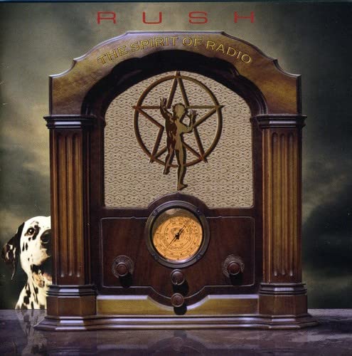 Dark wooden radio with golden accents and dog's head on left side.