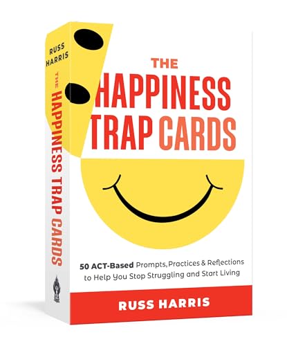 Card deck with yellow smiling face and red title: "The Happiness Trap Cards".