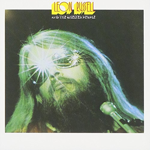 CD cover: Leon Russell portrait with green tint and starburst effect.