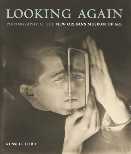 Book cover featuring a black and white photograph of a man with a mirror.