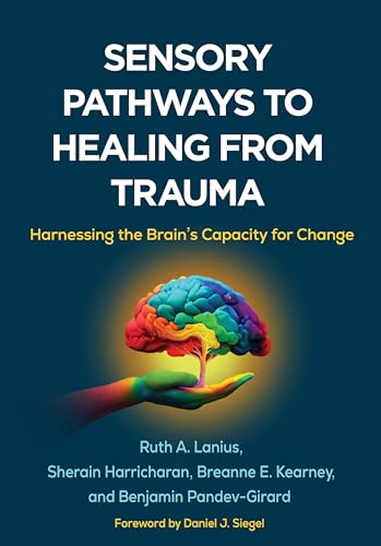 Book cover showing a colorful brain held by a hand on a dark background.
