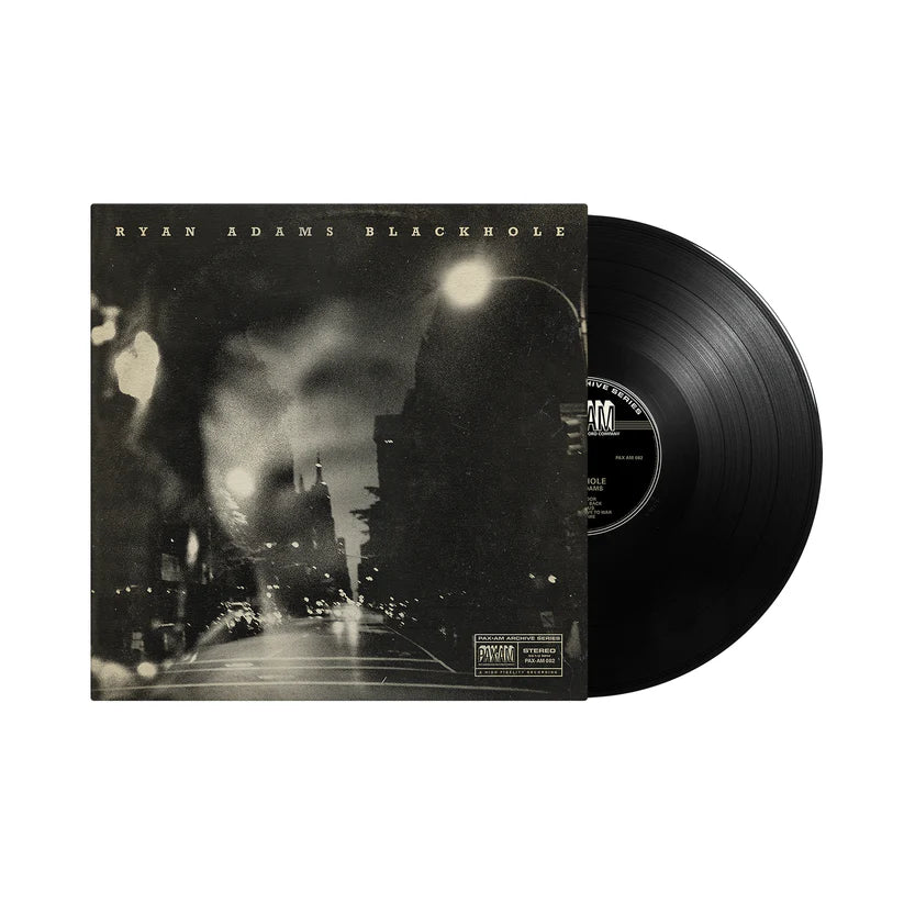 Ryan Adams’ “Blackhole” vinyl record and sleeve, black and white image.