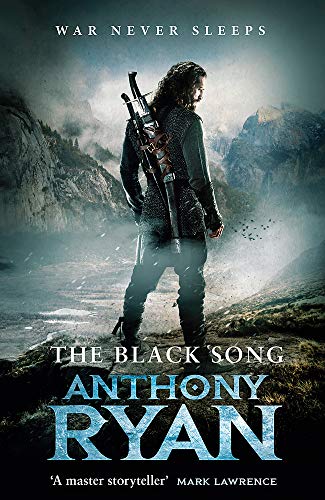 A warrior with a sword stands on a cliff overlooking a misty mountain landscape.
