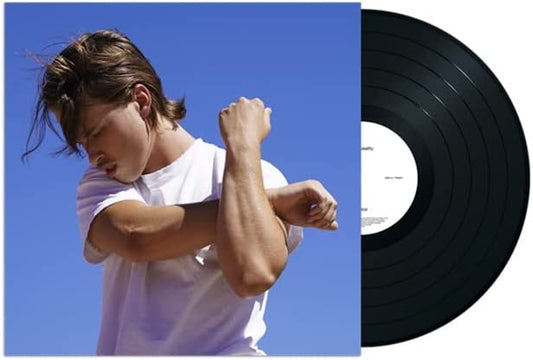 Vinyl record and cover art featuring a man in a white t-shirt.