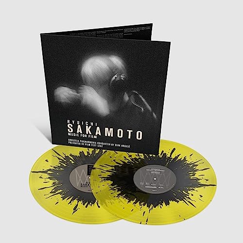 Ryuichi Sakamoto vinyl record set with yellow and black splatter discs.