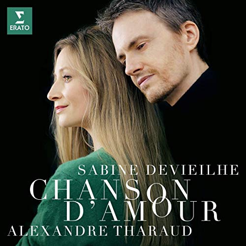 "Album cover with man and woman back-to-back against a black background."