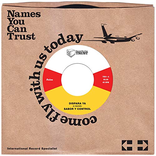 Vinyl record with yellow and red label, airplane graphic, and text.