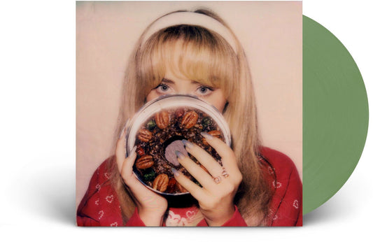 Sabrina Carpenter album cover with a woman holding fruitcake, olive green vinyl.