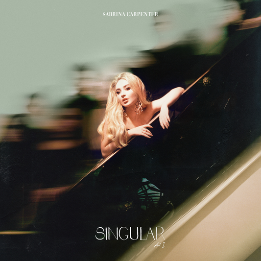 Sabrina Carpenter album cover, blurred motion, blonde hair, and dark background.
