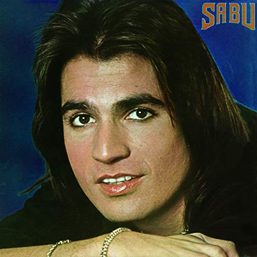 Close-up portrait of Sabu, album cover with blue gradient background.