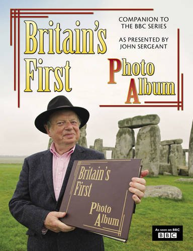 John Sergeant holds a book with Stonehenge in the background.
